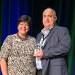 Jeff Moody, president of the College of Court Reporting, accepted the award on Beltz's behalf.