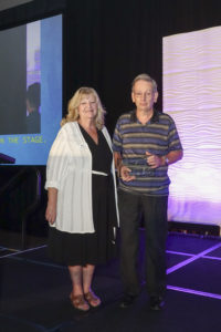 NCRF Chair Tami Smith presents 2019 Altruism Award to recipient Mervin Vaungh