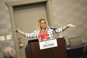 Presenter at podium 2024 NCRA Conference & Expo