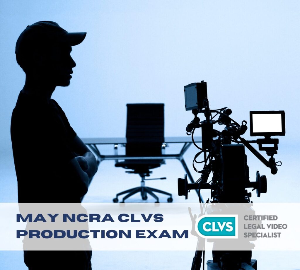 Silhouette of camera operator standing before a professional video camera. In the backround is a desk and chair with the camera lens trained at the desk.